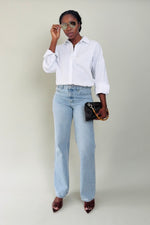 Tall model styling the MODACCIO Livia Jean with oversized white shirt and heels