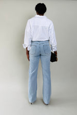 Back view of MODACCIO Livia Jean wide-leg jeans designed for tall proportions